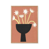 Schwarze Schale mit sternförmigen Blumen